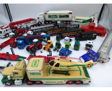 Twenty eight unboxed diecast and plastic model haulage models to include Hess and Corgi. UK P&amp;P Group 3 (£30+VAT for the 