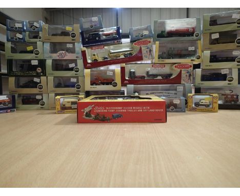 Thirty two boxed OO gauge track side diecast models by Oxford/Lledo, excellent condition. UK P&amp;P Group 2 (£20+VAT for the