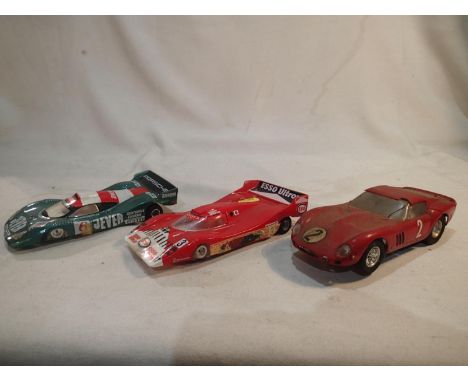 Three 1/24 scale slot cars, Ferrari 250 GT, and two Le Mans style cars with Parma Flexi 2 sidewinder chassis, al require atte