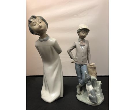 TWO NAO MALE FIGURINES, ONE WITH A DOG 