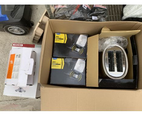 A TOASTER, TWO FLOOD LIGHTS, TAP AND LIGHT 