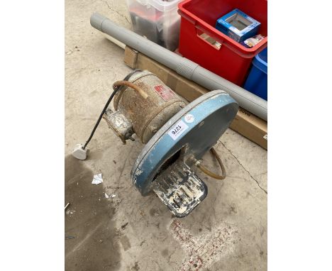 AN ELECTRIC GRINDER 