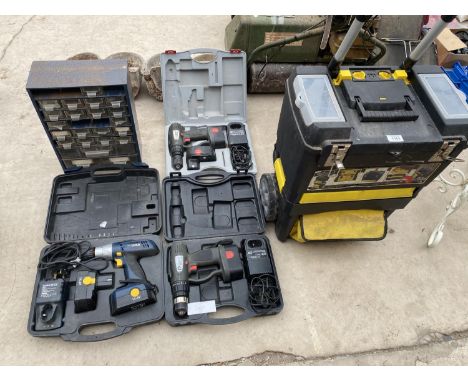 A TOOL BOX ON TROLLEY WHEELS, THREE RE-CHARGEABLE DRILLS AND A SMALL SET OF NUT AND BOLT DRAWERS 
