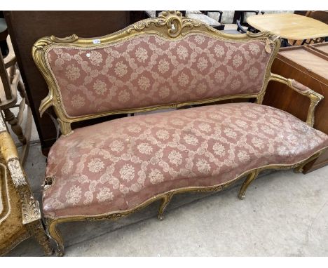 A NINETEENTH CENTURY GILDED THREE SEATER SOFA 