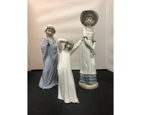 THREE NAO FEMALE FIGURINES 