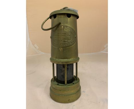 A VINTAGE MINERS LAMP 'BRITISH COAL MINING COMPANY WALES UK ABERAMAN COLLIERY SERIAL NO 136729 