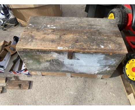 A WOODEN TOOL CHEST 
