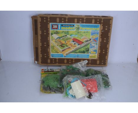 Britains Farm Vehicles Figures and Accessories,  boxed 9529 Massey Ferguson 135 tractor red/grey livery decals detached but p