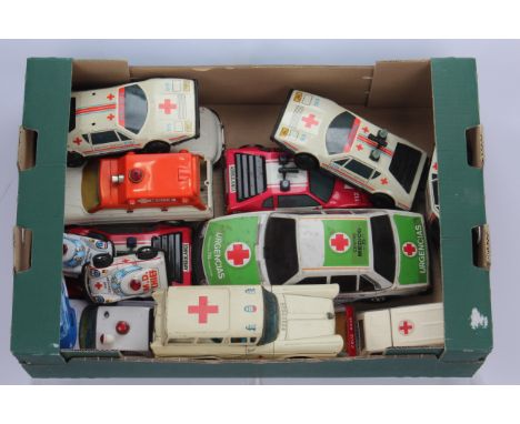 Mainly modern Tinplate Ambulances, Renault 18 GTS, Skoda, Airport Service Ambulance Car (3, two lack roof detail) and two red