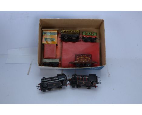 Hornby 0 Gauge Post-war Tank Locomotives Rolling Stock and Accessories, pair of BR black Type 40 Tanks (one with a little res