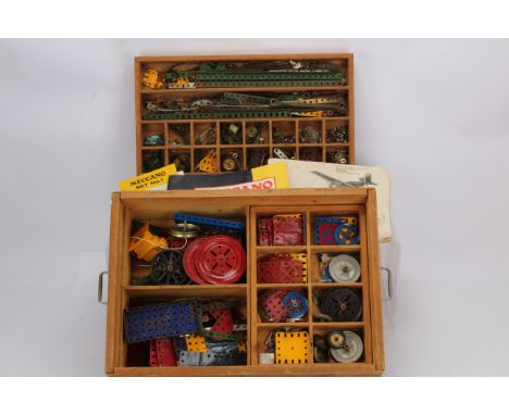 Collection of playworn 1950's 70's Meccano in purpose made wooden box, including green girders, various red plates, Ball cage