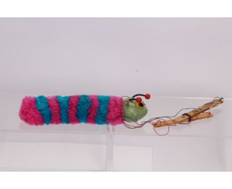 Pelham Puppet A6 Caterpillar,  with green head with both antennas and eyes, pink and blue body, operating sticks and untangle
