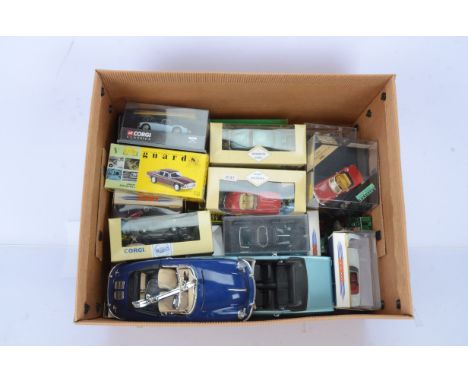 Modern Diecast Vehicles, in various scales, vintage and modern cars, some models boxed but all loose in boxes from display so