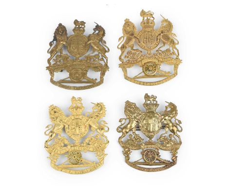 Royal Artillery: four home service helmet plates, the first a Victorian officer's gilt example; the next also gilt, for an of
