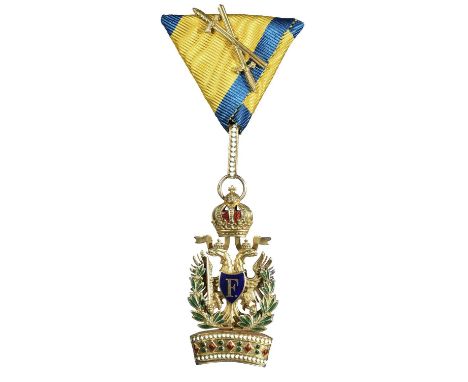 Austria; the Imperial Order of the Iron Crown, 3rd class knight's breast badge with swords, gilt and enamels, base inscribed: