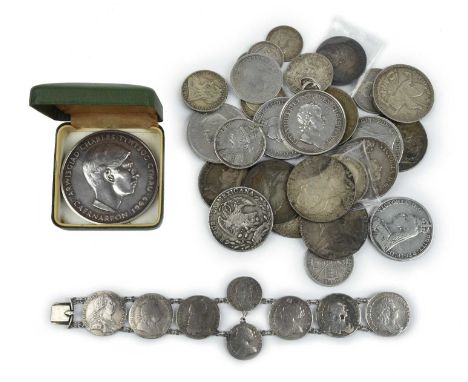 An international collection of silver and cupro-nickel crowns, crown equivalents and smaller denominations, including: Victor