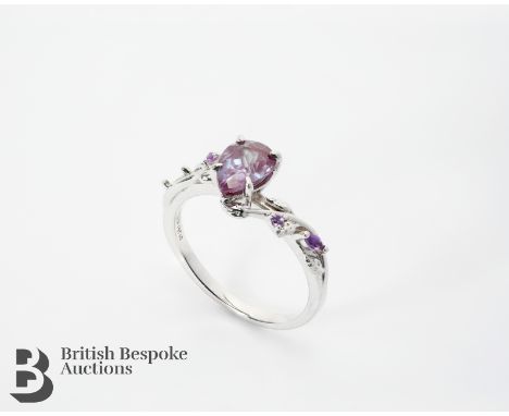 Platinum alexandrite and amethyst ring. Tear shape alexandrite approx. 1.25ct and 0.072ct of amethyst. Numbered 24891, size P