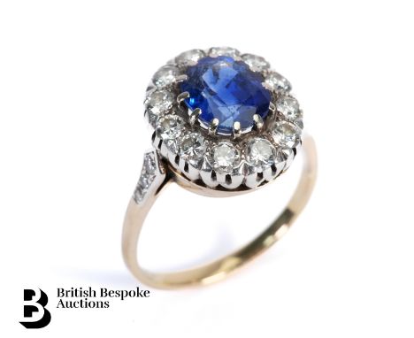 18ct gold cornflower blue Ceylon natural sapphire and diamond ring. The ring set with an oval sapphire 2 to 2.5 ct, measuring