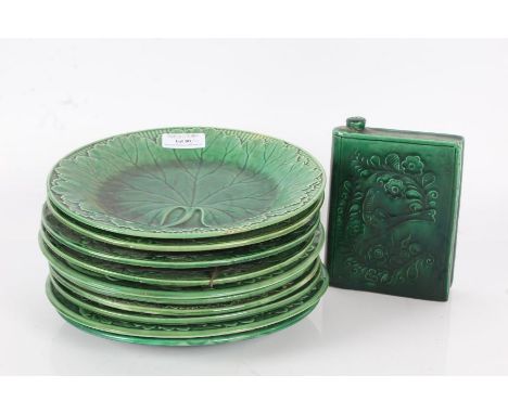 Collection of ten 19th century green glazed leaf plates, to include one Wedgwood example and a green glazed flask form as a b