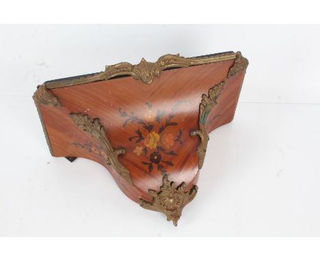 French kingwood veneered inlaid wall bracket, with gilt metal mounts and ebonised platform, 35cm wide