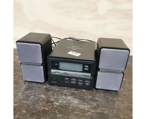 A mini digital compact disc player.