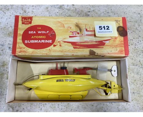 A boxed clockwork Sutcliffe model submarine, box L. 26cm.