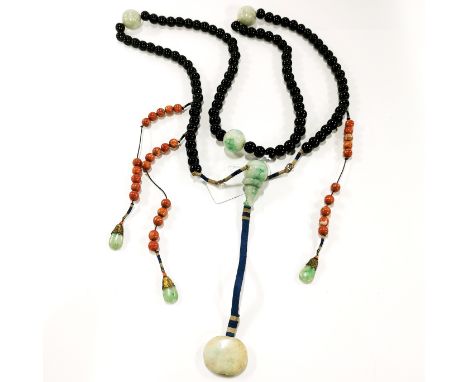 A long strand of Himalayan Buddhist black onyx and jade prayer beads, folded L. 88cm.
