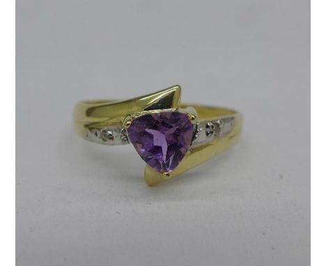 A 9ct gold, amethyst and diamond ring, 1.2g, O