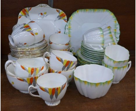 Two decorative china tea sets, Grafton and Melba, lacking two cups (green)