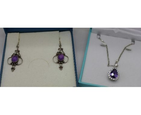 Silver and amethyst earrings and a silver and purple stone pendant and chain