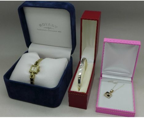 A lady's Rotary wristwatch, a silver bangle and a silver pendant with chain