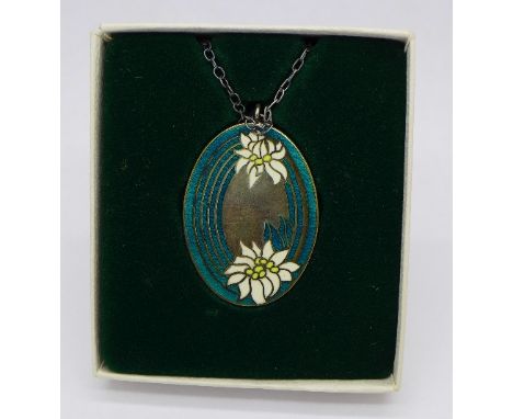 A silver and enamel pendant on chain, 3cm x 4cm, with box, The Save a Wildflower Pendant