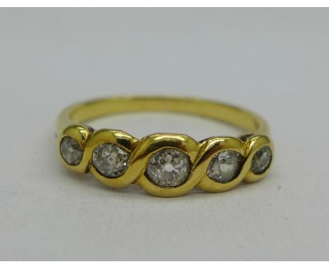 A yellow metal and five stone diamond ring, 2.5g, K