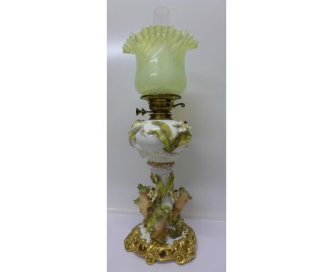 A Moore Brothers oil lamp decorated with orchids, height 67cm