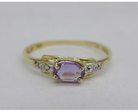 A 9ct gold, diamond and amethyst ring, 0.9g, O