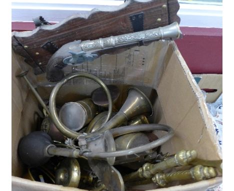 A box of brass including a reproduction ship's bell, car horn, horn, pans, companion set, etc.