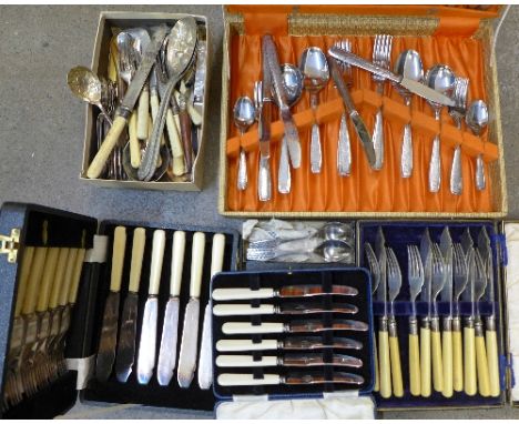 A collection of cased and loose flatware including fish knives and forks with silver ferrules, one knife missing
