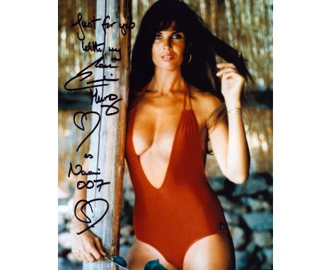 Caroline Munro James Bond actor signed super sexy 10 x 8 inch colour red swim suit photo. Rare, inscribed Naomi 007. English 