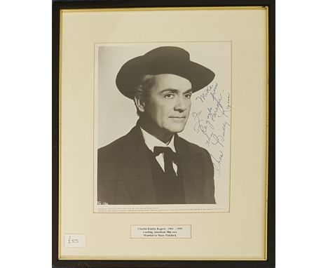 Charles Buddy Rogers signed black and white photo in blue ink. Mounted and framed to approx. 16x12. Dedicated. Good Condition