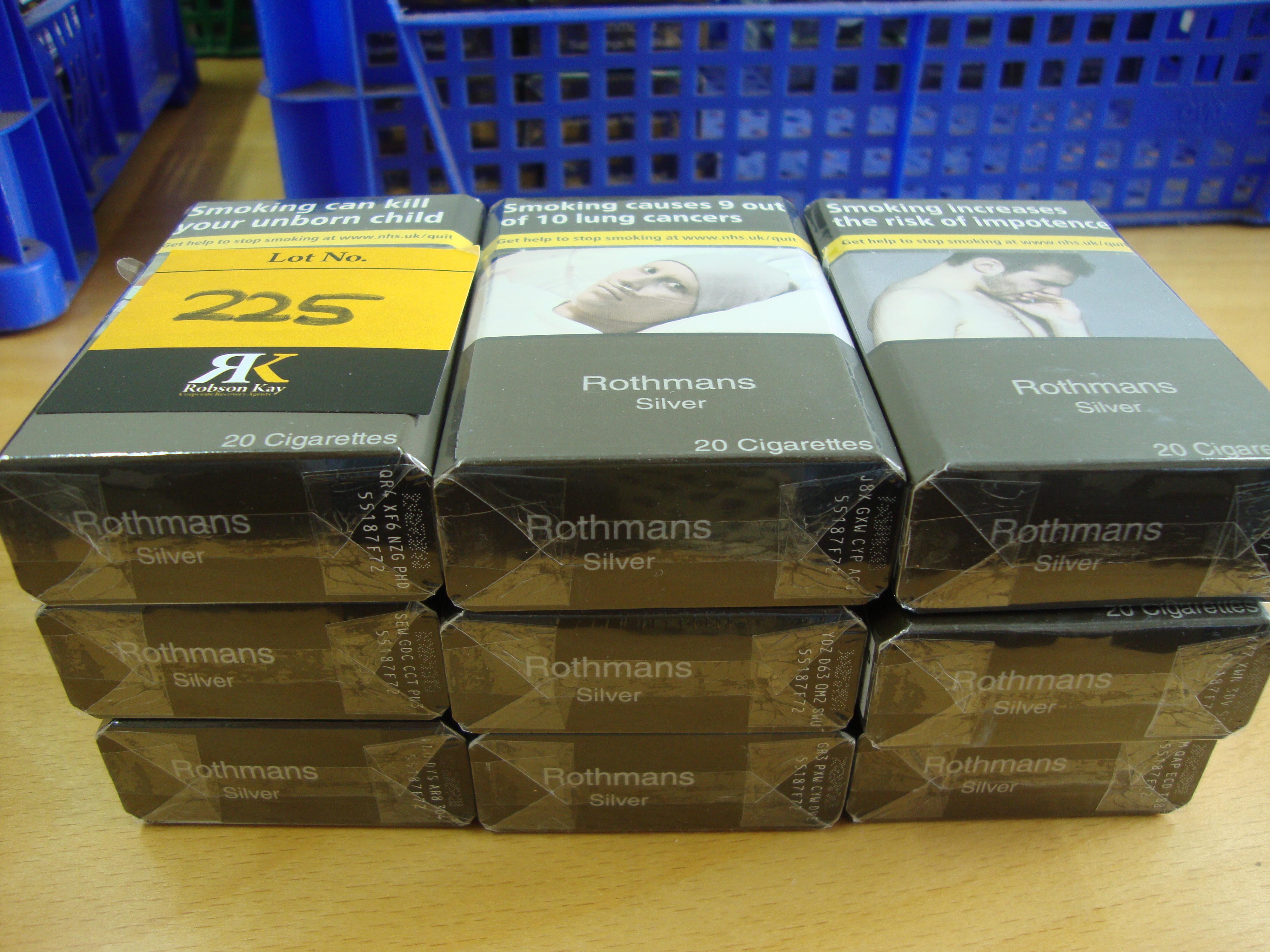 9 packs of Rothmans Silver cigarettes NB. All pack sizes 20