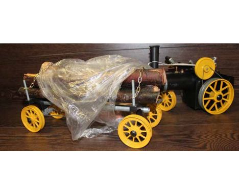 MAMOD MODEL STEAM TRACTOR
powered with meth fuel, together with a matching Mamod log wagon accessory, log wagon 35cm long
