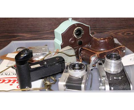 SELECTION OF VINTAGE CAMERA EQUIPMENT
including Minolta, Konica, Fed, Smiths pale blue electric alarm clock, Leica photograph