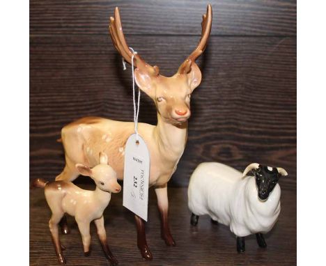 GROUP OF THREE BESWICK FIGURES MODELLED AS ANIMALS
including a stag, a ram and a fallow deer, each with black factory stamp, 