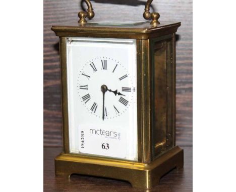 BRASS CARRIAGE CLOCK
with white enamel dial, 11cm high