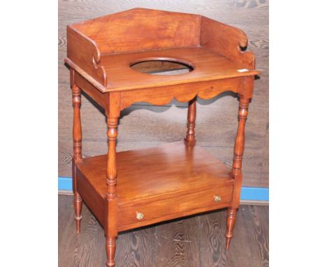 MAHOGANY WASHSTAND
with later ceramic accessories