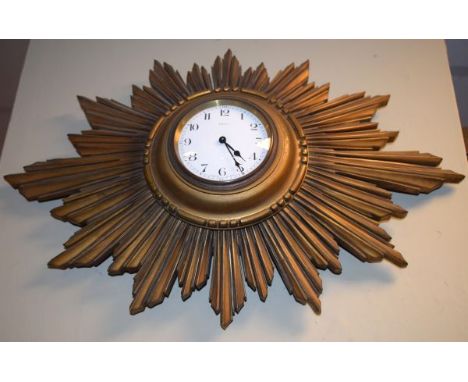 Early 20th Century giltwood cased 'Sunburst' wall clock, white enamel dial with Arabic numerals, French brass movement   Cond