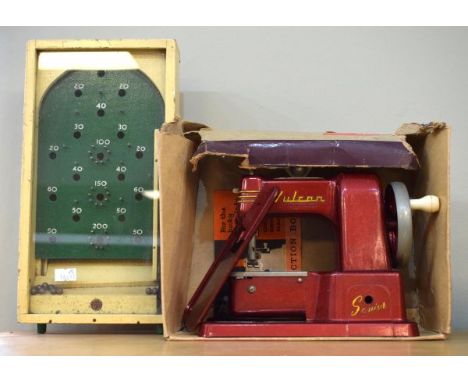 Vintage Vulcan child's sewing machine, together with a small Chad Valley bagatelle game   Condition: 