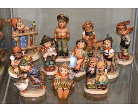 Eleven Goebel Hummel figures - Signs Of Spring, Soldier Boy, Friends, March Winds, Chick Girl, Little Goat Herder, Lost Sheep