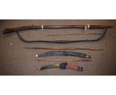 Ethnographica - Wooden bow, spear, arrows and a primitively constructed 'Duck' gun etc   Condition: 