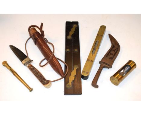 Various items including; brass faced spirit level, parallel rule, sheath knives, brass cased egg timer etc Condition: